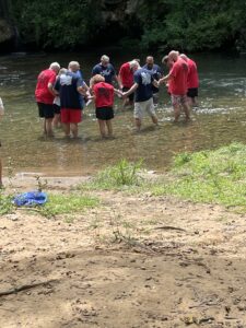 Prayer with those who would be helping with the baptisms.